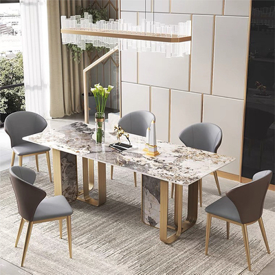 Table de salle à manger longue en marbre italien personnalisée avec pieds en métal doré