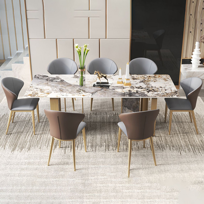 Table de salle à manger longue en marbre italien personnalisée avec pieds en métal doré